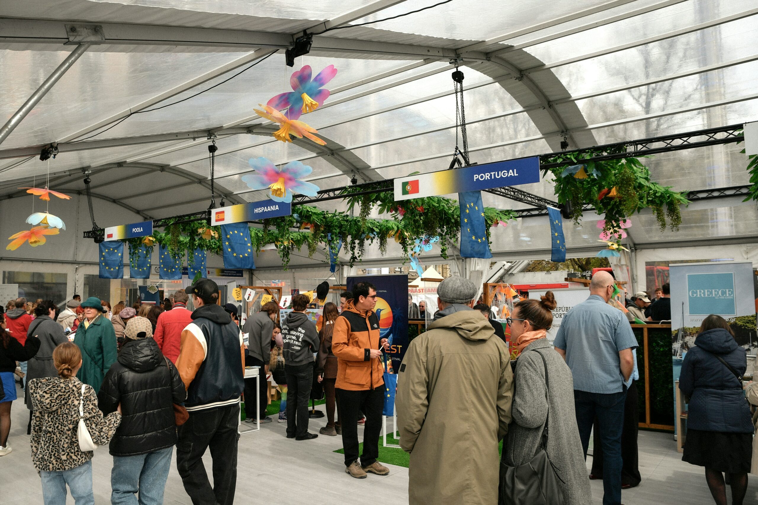 Visitors at a busy trade show exhibition