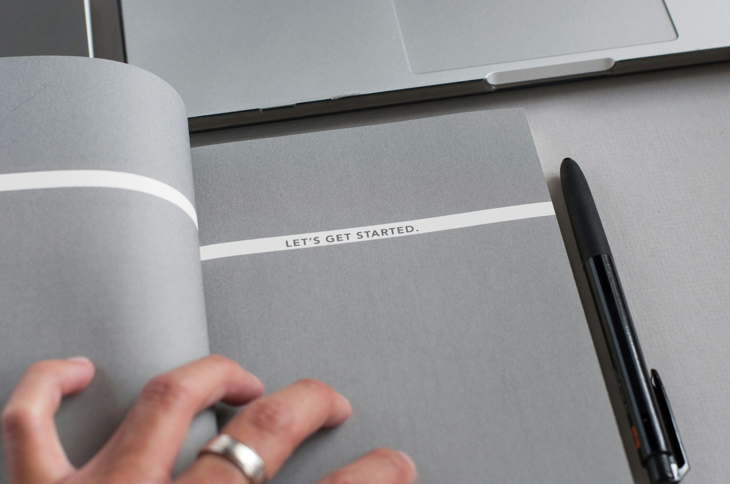 Notebook with "Let's get started" on the cover